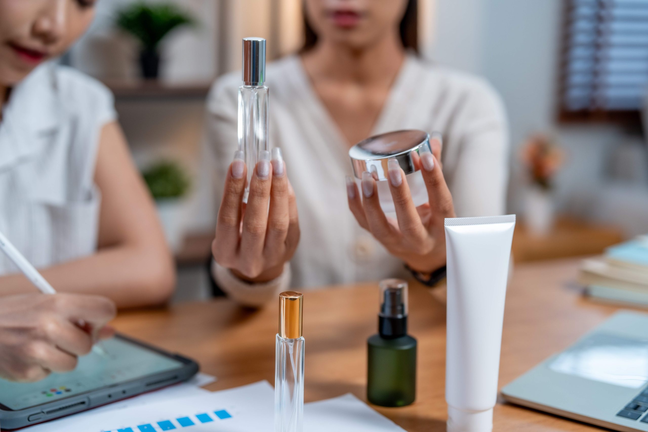 Creating effective cosmetic packaging is essential for marketing and planning successful product launches. image showcases various cosmetic containers, highlighting importance of design attracting