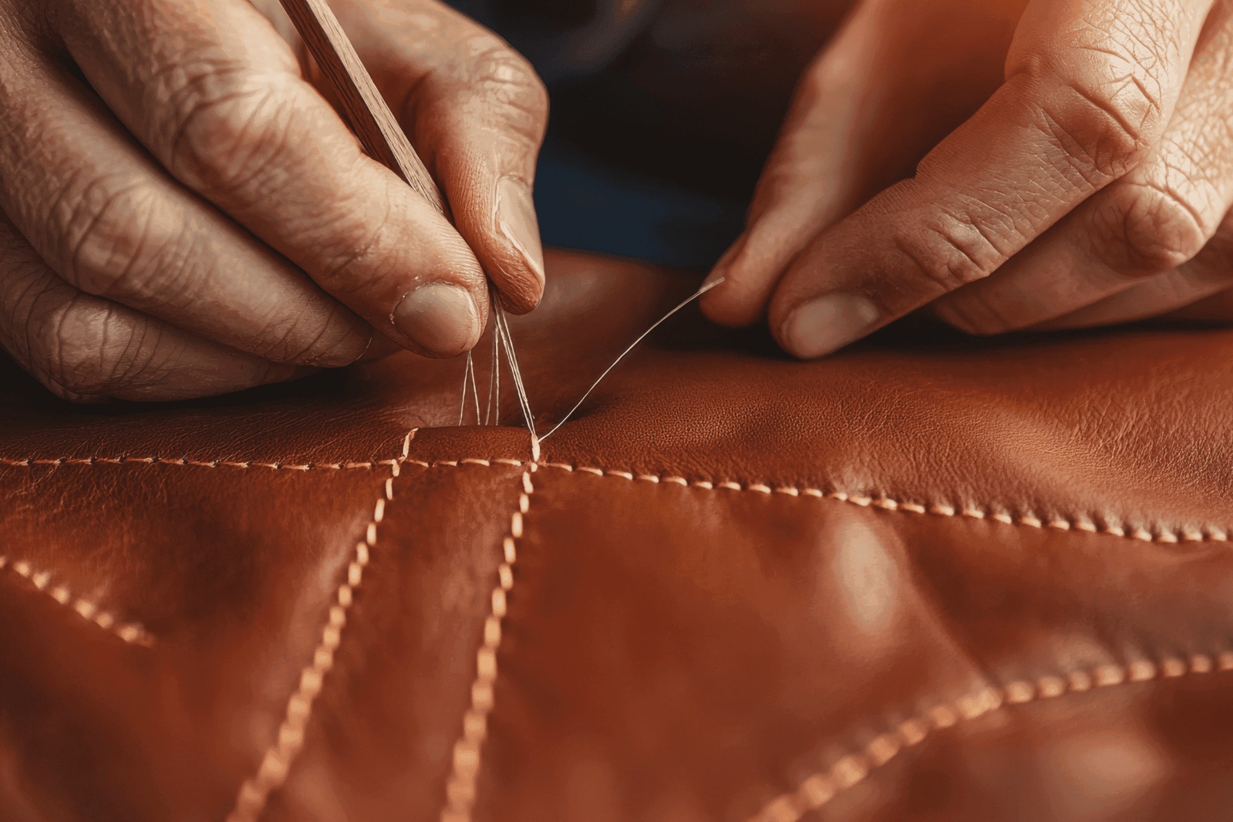 Someone sowing in leather