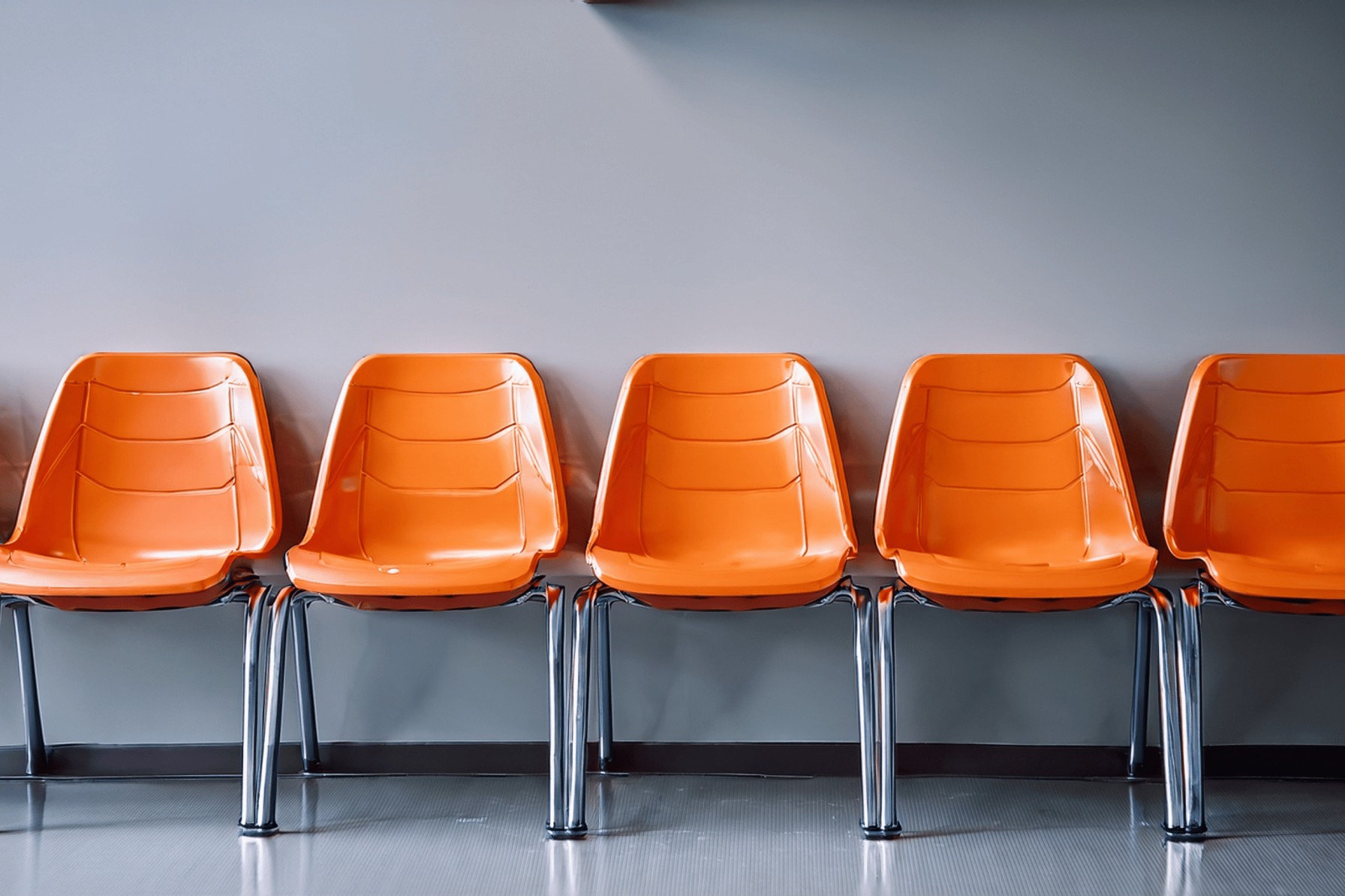 line of orange chairs