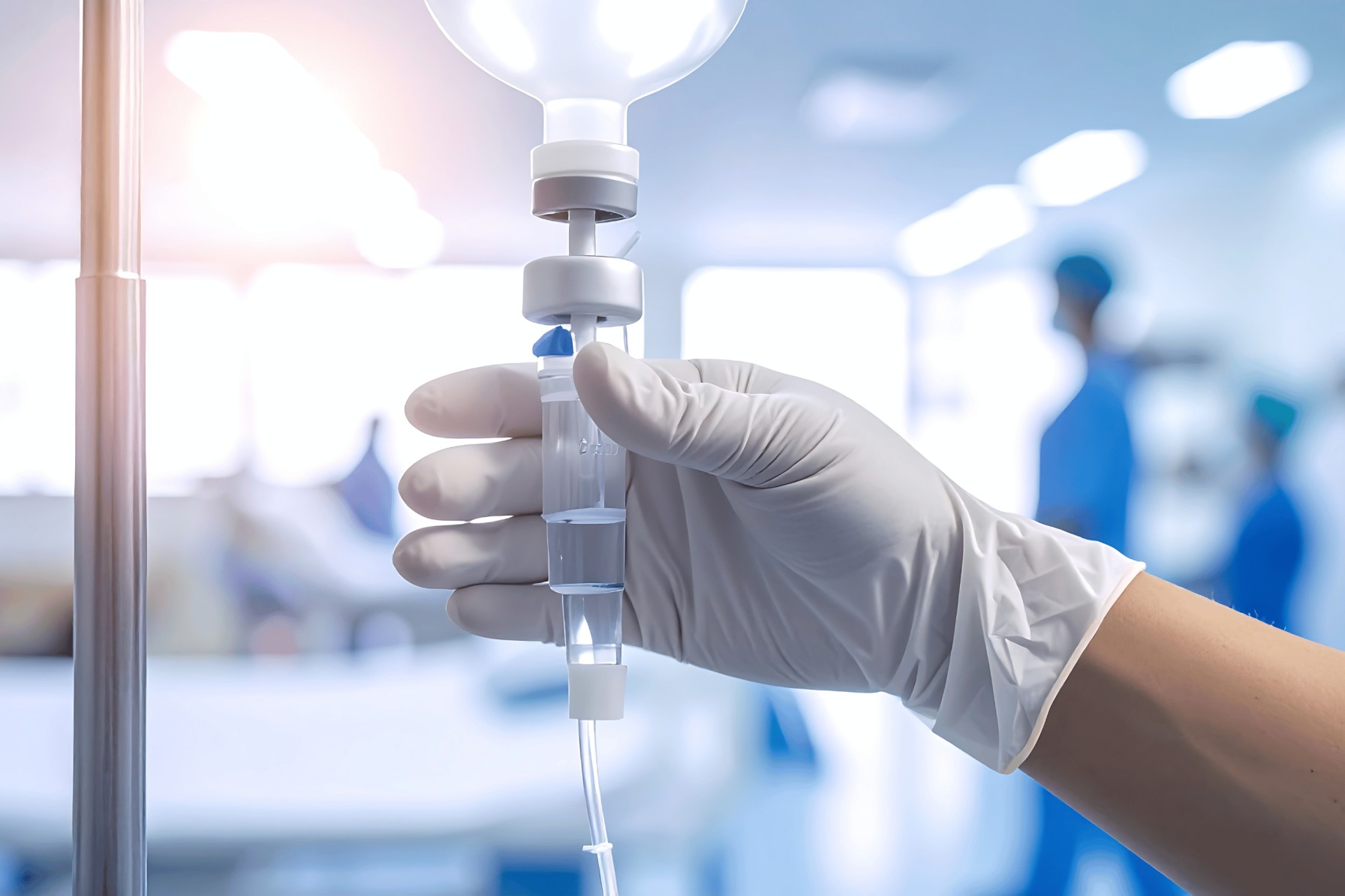 Hand of a nurse put on a meds dispenser