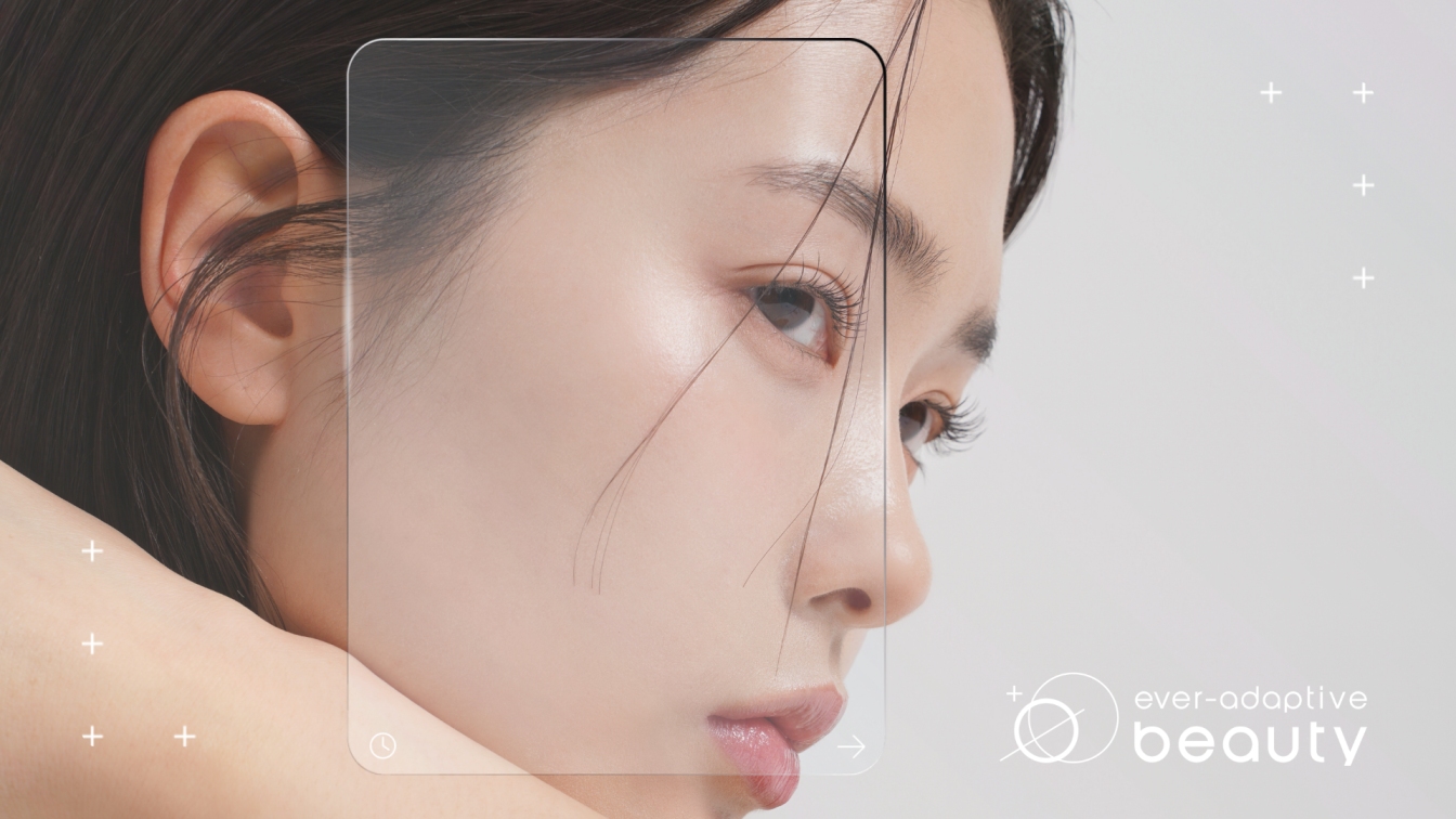 Close-up beauty portrait of a woman with a transparent frame overlay across her face, next to the 'ever-adaptive beauty' logo, representing the Givaudan x Safic-Alcan Ever-Adaptive Beauty campaign